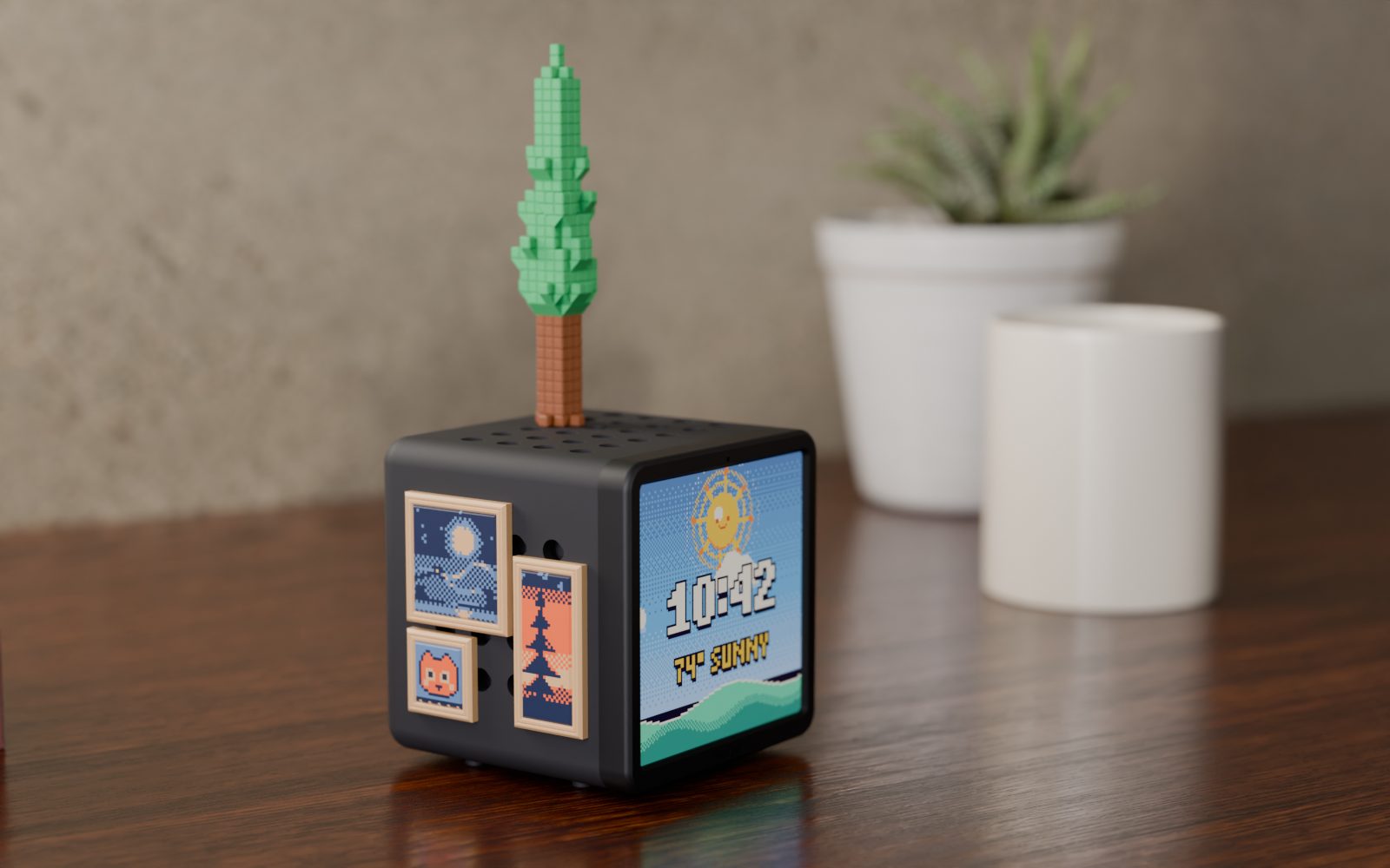 Rendered scene: a black Hollo on a sunny wooden desk, with a tall pixel tree and three small framed pixel paintings
